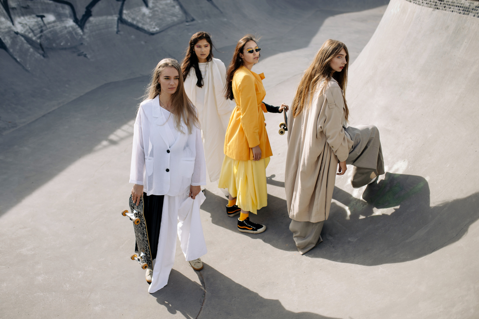 Fashionable Women at the Skate Park